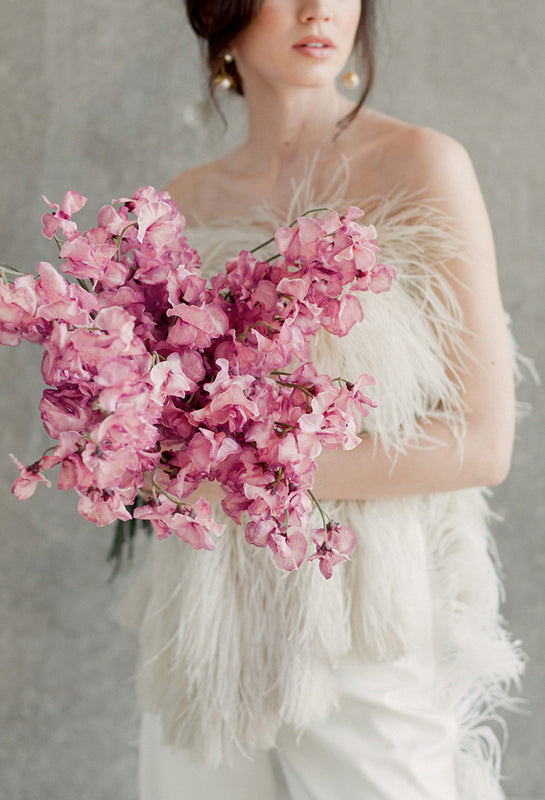 Sara Donaldson Photograph | Editorial featuring beautiful pink and violet tone bridal bouquet and ostrich feather top and pants. Bridal separates for a modern bride.